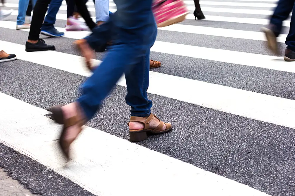 Woman crossing the street